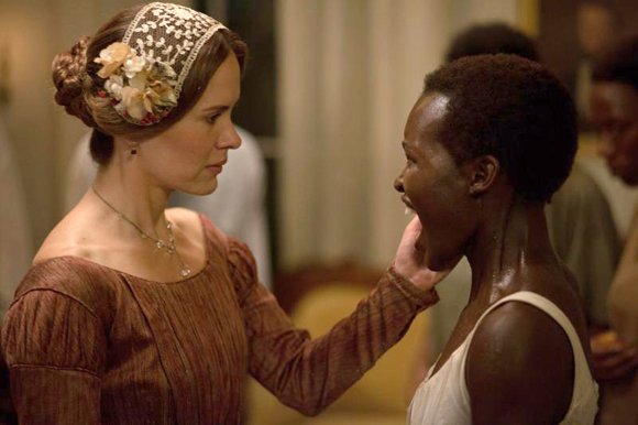 Sarah Paulson as "Mistress Epps" and Lupita Nyong'o as "Patsey" in Steve McQueens's “12 Years A Slave.”