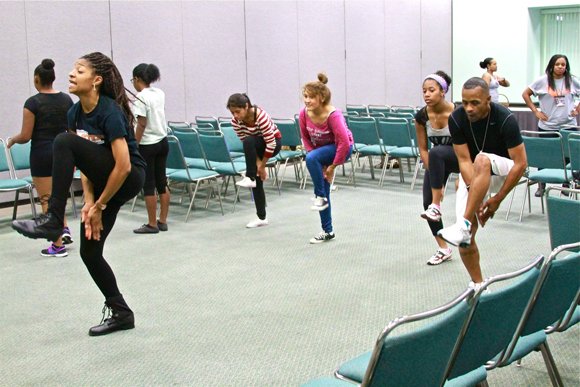 Expo attendees participate in the Step 4 Health Fitness Clinic.