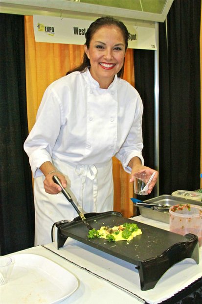 Chef Barbie Flores cooks up healthy recipes at the West Coast Expo Tasting Spot.