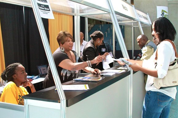 Participants receive their Expo vendor kits.