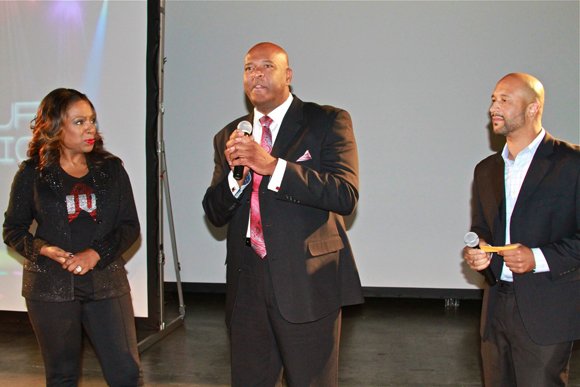 Fashion show hosts Kevin Nash and Sheryl Lee Ralph with COO David Miller.