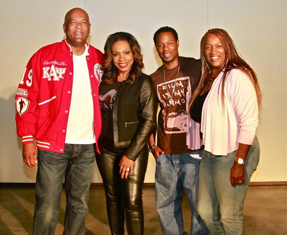 Celebrity hosts Darrin Henson and Sheryl Lee Ralph pose with West Coast Expo creators Natalie Cole and David Miller.