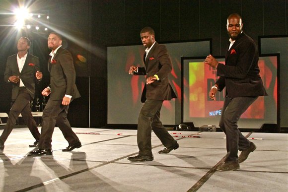 Members of Kappa Alpha Psi Fraternity Inc. groove during their step routine.