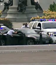 This exclusive image taken from Alhurra Television shows the car that was being chased by authorities in DC, which ended in U.S. Capitol police opening fire on Thursday, October 3, 2013.