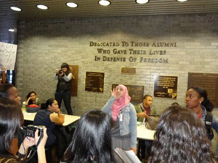 Students enter Student area via side door and have open mike near cop barricade
of doors leading to the Morales/Shakur Community Center
