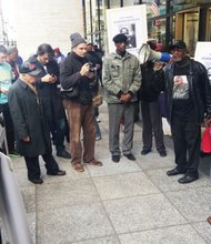 Protesters march in front of the George W. Dunne Cook County Office Building, 69 W. Washington against the death of Flint Farmer by Chicago Police Officer Gildardo Sierra and calling for the resignation of Cook County State’s Attorney, Anita Alvarez. 