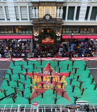 The South Shore Drill Team performs in the 87th Macy’s Thanksgiving Day Parade in New York City on Nov. 28, 2013. 	