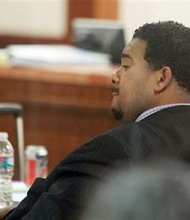 Efram Holmes, bodyguard of of singer Patti LaBelle, sits in the courtroom at the Harris County Criminal Courthouse on Thursday, Nov. 7, 2013, in Houston.