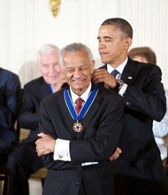 President Barack Obama delivers awards the 2013 Presidential Medal of Freedom to minister, author, and close friend and lieutenant of Reverend Martin Luther King, Jr., Cordy Tindell “C.T.” Vivian, during a ceremony in the East Room of the White House, Nov. 20, 2013.