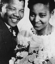 Nelson Mandela is accompanied by his wife Winnie, moments after his release from Victor Verster prison. 