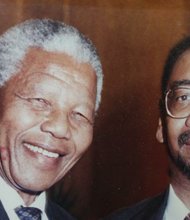 Former South Africa President Nelson Mandela and U.S. Congressman Bobby Rush during Mandela's 1993 visit to Chicago visit. 
