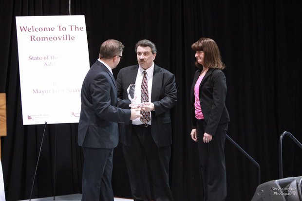 Sam's Club received the New Business of the Year Award from Romeoville Mayor John Noak at the State of the Village luncheon.