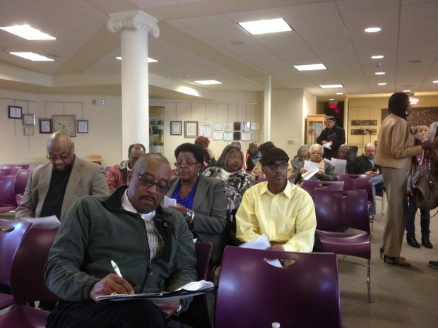 Unity Community Development Corporation President Mac Willis takes a few notes while preparing for the informational session held March 15 at the Joliet Historical Museum.