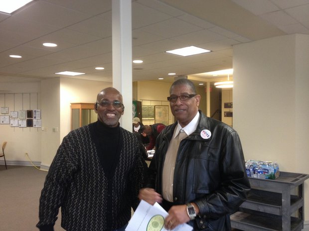 Will County Board Speaker Herb Brooks (D-Joliet) (right) is seen at the session with Larry Crawford.