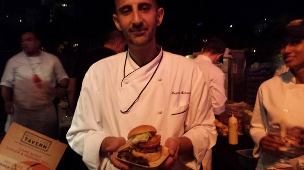 Ready to eat: A chef displays his burger creation.