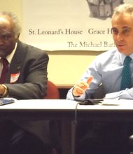 L-R: U.S. Cong. Danny K. Davis (D-7th Dist.) and Chicago Mayor Rahm Emanuel take part in a round table discussion at St. Leonard's Ministries on Chicago’s west side last Friday with 27th Ward Ald. Walter Burnett and Illinois State Sen., Patricia Vanpelt (D-5th Dist.) prior to announcing a pilot family reunification program that will allow 50 formerly incarcerated individuals to move back into CHA housing over the next three years.