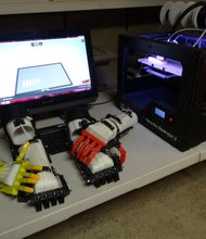 Its designs are open source, meaning anyone with access to 3-D printers can print out the parts and assemble them.