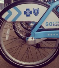 As part of Blue Cross Blue Shield of Illinois’ exclusive sponsorship agreement, Divvy bikes and vans in Chicago will soon sport an updated design with the Blue Cross Blue Shield logos.