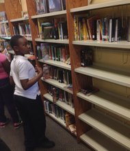 Faculty at Walter Q. Gresham Elementary School, 8524 South Green Street, celebrated the opening of the school's new library during “Literacy Day”.