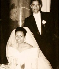 First Lady, Michelle and President Barack Obama seen here on their wedding day, will decide what items will go on display in the Barack Obama Presidential Library.