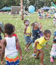 Children have a bubblicious time at a National Night Out event at J.L. Francis Elementary School on South Side. 