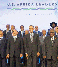 President Obama poses Wednesday for a photo at the Africa Leaders Summit. He is standing between Mohamed Ould Abdel Aziz, left, president of the Islamic Republic of Mauritania, and Hifikepunye Pohamba, president of the Republic of Namibia, at the State Department in Washington DC. The president is promoting business relationships between the United States and African countries during the three-day summit.