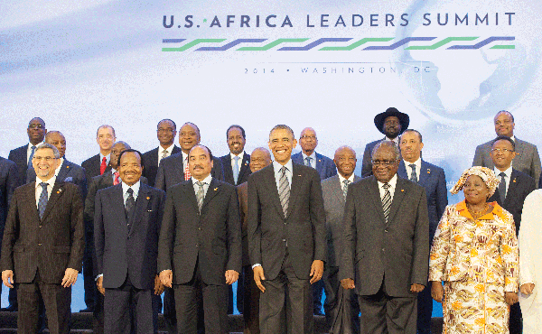 President Obama poses Wednesday for a photo at the Africa Leaders Summit. He is standing between Mohamed Ould Abdel Aziz, left, president of the Islamic Republic of Mauritania, and Hifikepunye Pohamba, president of the Republic of Namibia, at the State Department in Washington DC. The president is promoting business relationships between the United States and African countries during the three-day summit.