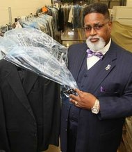 The Rev. Hasan K. Zarif shows off new suits Goodwill Industries can provide his clients to help them make a good impression when job hunting. As Goodwill’s re-entry coordinator, he primarily works with and advocates for released felons who are trying to rebuild their lives.