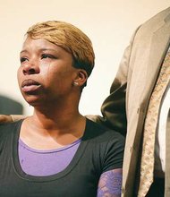 Lesley McSpadden weeps over the police killing of her son, Michael Brown Jr., in Ferguson, Mo. His death has sparked protests and riots in the community outside St. Louis.