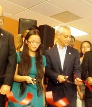 (L-R) Jones College Prep High School Principal, P. Joseph Powers; Jones College Prep High School student, Chicago Mayor Rahm Emanuel, 4th Ward Ald., William Burns take part in a ceremonial ribbon cutting last Wednesday to unveil the newly renovated Jones South building at 606 S. State Street. Jones College Prep High School is now a two-building campus with the new building at 700 S. State St. Prior to the expansion and renovations in August 2013, the South Loop school served 900 students. The new building and renovations will increase enrollment to 1,700 students by 2016.