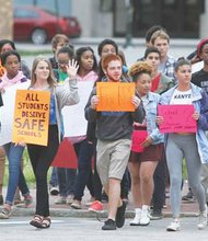 Students from Open High School march along Broad Street in route to City Hall to protest deplorable conditions of some Richmond Public Schools