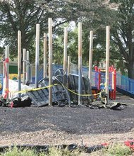 This ugly scene shows all that remains of fire-ravaged playground equipment. Location: Fairfield Court Elementary School in the East End. The $120,000 in swings, slides and other equipment was torched Friday, depriving neighborhood children of a popular play space. Believe it or not, this is the ninth case of arson of school playground equipment in Richmond in just the past two years. Replacements have cost more than $1 million, with the school system having to pay $50,000 on each for insurance deductibles. In a few cases, private donors have contributed. No one can understand why this equipment is being targeted. 
