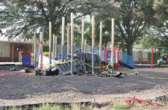 This ugly scene shows all that remains of fire-ravaged playground equipment. Location: Fairfield Court Elementary School in the East End. The $120,000 in swings, slides and other equipment was torched Friday, depriving neighborhood children of a popular play space. Believe it or not, this is the ninth case of arson of school playground equipment in Richmond in just the past two years. Replacements have cost more than $1 million, with the school system having to pay $50,000 on each for insurance deductibles. In a few cases, private donors have contributed. No one can understand why this equipment is being targeted. 
