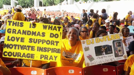Frances Bruce, seen here holding her now famous sign, is perhaps as famous as the Jackie Robinson West All Stars, Little League Baseball’s 2014, World Series U.S. Champions.  The proud grandmother of JRW player, DJ Butler, has been seen on television during the games, demonstrating her support of the entire team. 