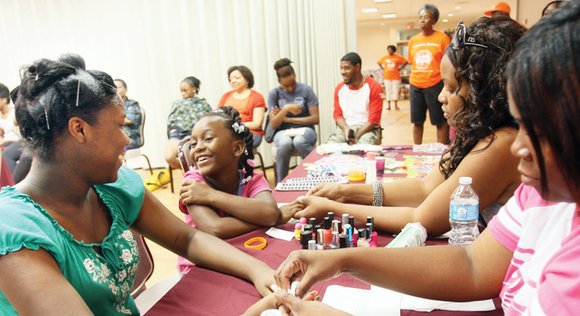 Volunteers spent Labor Day helping Richmond students get ready for the start of classes.
