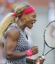 Serena Williams shows the drive and intensity that propelled her to her third straight victory in the U.S. Open. She easily beat Caroline Wozniacki of Denmark in two sets to claim her 18th grand slam title.