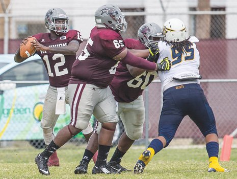 Shawn Dowdy, No. 12, looks for another receiver as VUU linemen block a Siena Heights rusher. Dowdy threw for 248 yards and a touchdown in leading the Panthers to a 12-0 victory over the visitors, the Panthers’ first shutout since 2011. The VUU defense recorded three interceptions and a safety. Next up: University of Charleston 1 p.m. Saturday at Hovey Field. 