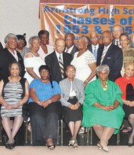 Six decades later, these proud Armstrong graduates gather for a reunion photograph at Club 533.