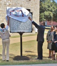 Girl scouts and dignitaries representing Girl Scouts of the Commonwealth of Virginia unveil a historic marker on the campus of Virginia Union University commemorating the first Southern African American Girl Scout Troop that began on the campus in 1932.  