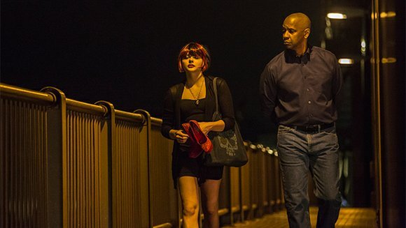 Teri (Chloë Grace Moretz) being walked home by Robert McCall (Denzel Washington).