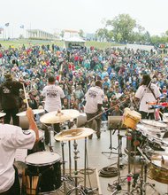 An estimated 125,000 people turned out for last weekend’s 10th Annual Richmond Folk Festival held along the banks of the James River and on Brown’s Island. Washington-based go-go band Trouble Funk gets the 
crowd going.