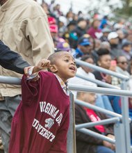 Three-year-old Trey Manley cheers on the Virginia Union University Panthers during their homecoming victory Saturday at Hovey Field.