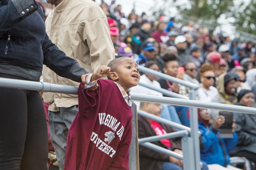Three-year-old Trey Manley cheers on the Virginia Union University Panthers during their homecoming victory Saturday at Hovey Field.