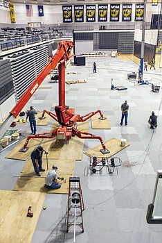 Workers are busy readying the Stuart C. Siegel Center at Virginia Commonwealth University
for the start of basketball season, with a free preview of the men’s team 5 p.m. Sunday, Oct. 26, at the annual Black & Gold Game. The arena will be enhanced with four new luxury suites, a new scoreboard over center court, installation of a new sound system and new branding marks for VCU and the Atlantic 10 conference. The center’s seating capacity will remain about 7,700.