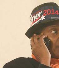 Sandra Antoine was among the many Mark Warner supporters waiting to hear election results at the Southern Kitchen in Shockoe Bottom. 