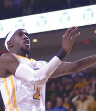 Briante Weber leaps for a layup Tuesday night in the Virginia Commonwealth University Rams’ 87-78 victory over the University of Toledo Rockets at the Siegel Center.