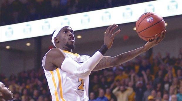 Briante Weber leaps for a layup Tuesday night in the Virginia Commonwealth University Rams’ 87-78 victory over the University of Toledo Rockets at the Siegel Center.