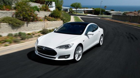 Tesla has inched ahead of General Motors to become the most valuable car company in America.