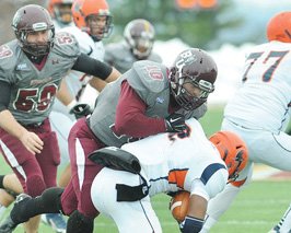 VSU quarterback Tarian Ayres gets sacked — one of six — during the second-round NCAA playoff game against the Bloomsburg State University Huskies in Pennsylvania. 