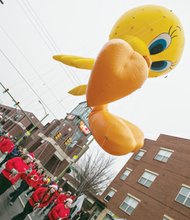 Marchers guide the gigantic Tweety Bird balloon, sponsored by Martin’s Food Markets, down Broad Street at the Christmas Parade on Dec. 6th.